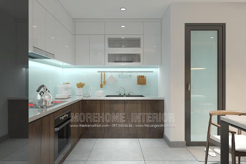 Màu xanh ngọc mát mẻ của kính ốp bếp giúp xua đi sự nóng bức của không gian nấu nướng.